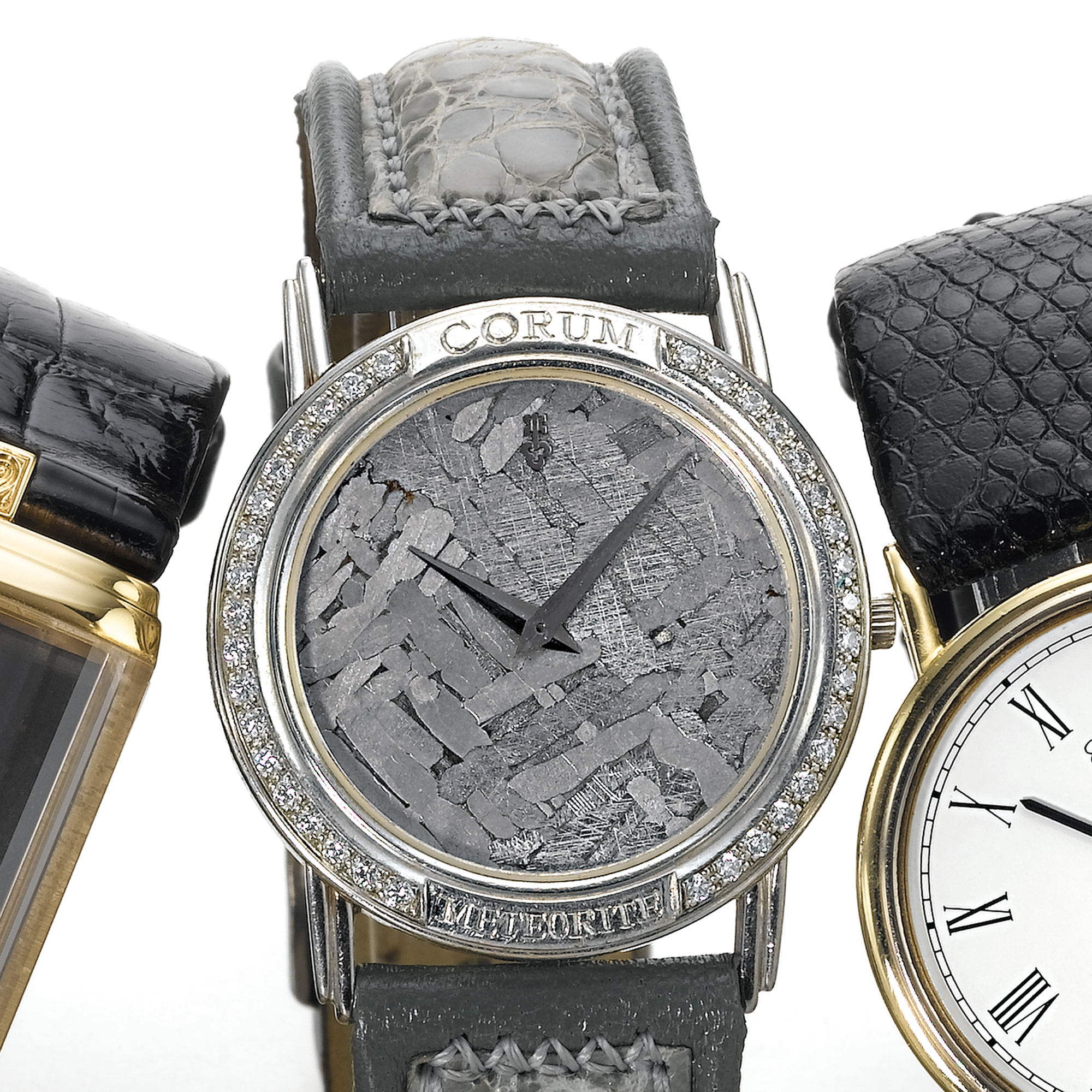 CORUM, A MID SIZE PLATINUM AND DIAMOND SET WRISTWATCH WITH METEORITE DIALCIRCA 1985, NO. 1024