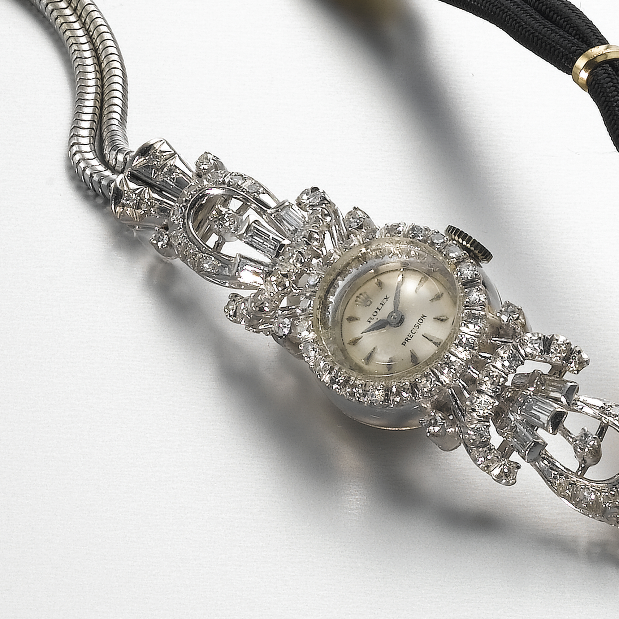 ROLEX, A LADY'S WHITE GOLD AND DIAMOND SET BRACELET WATCHPRECISION, REF. 8916, CIRCA 1955
