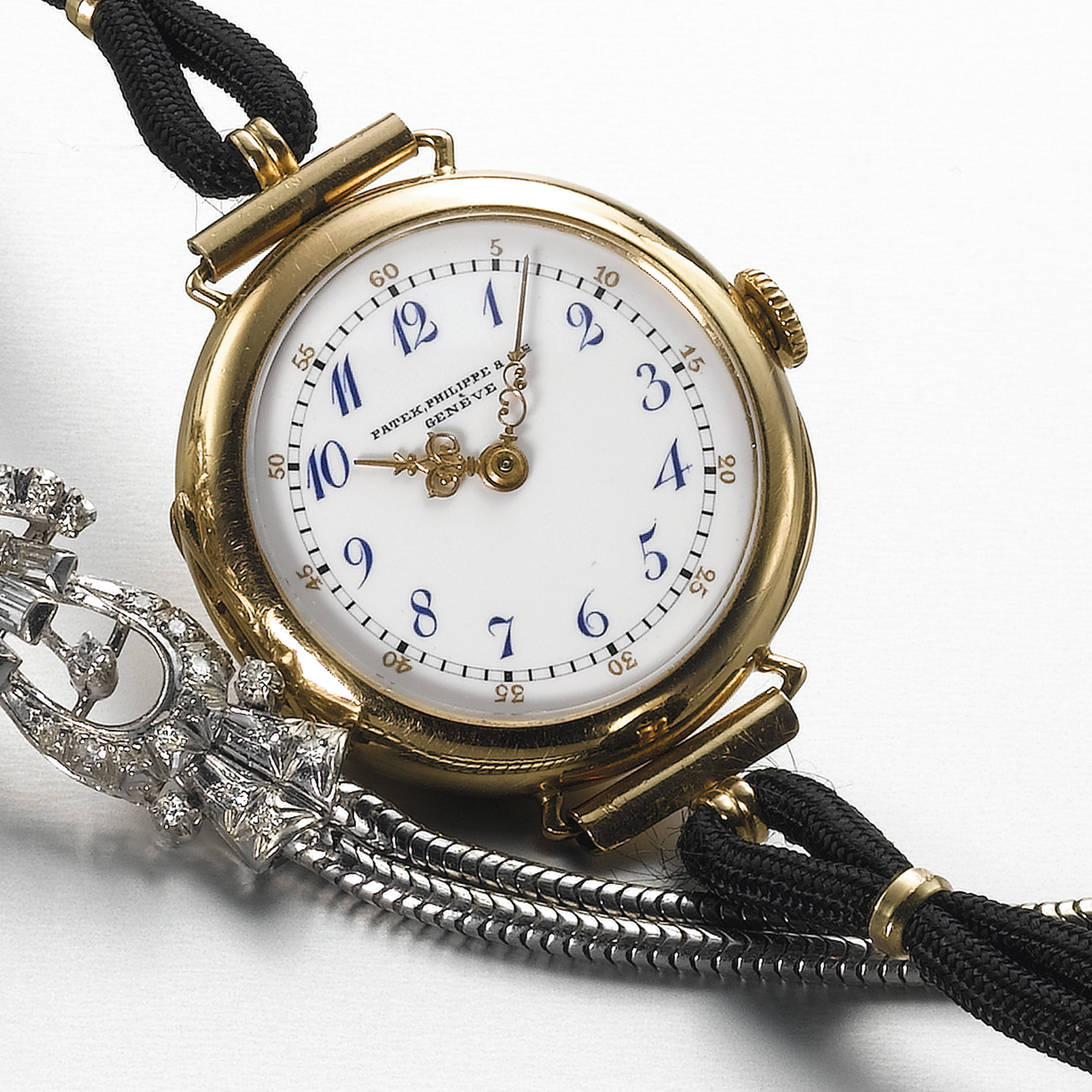 PATEK PHILIPPE, A LADY'S GOLD WRISTWATCH WITH ENAMEL DIAL CIRCA 1899, NO. 112.939