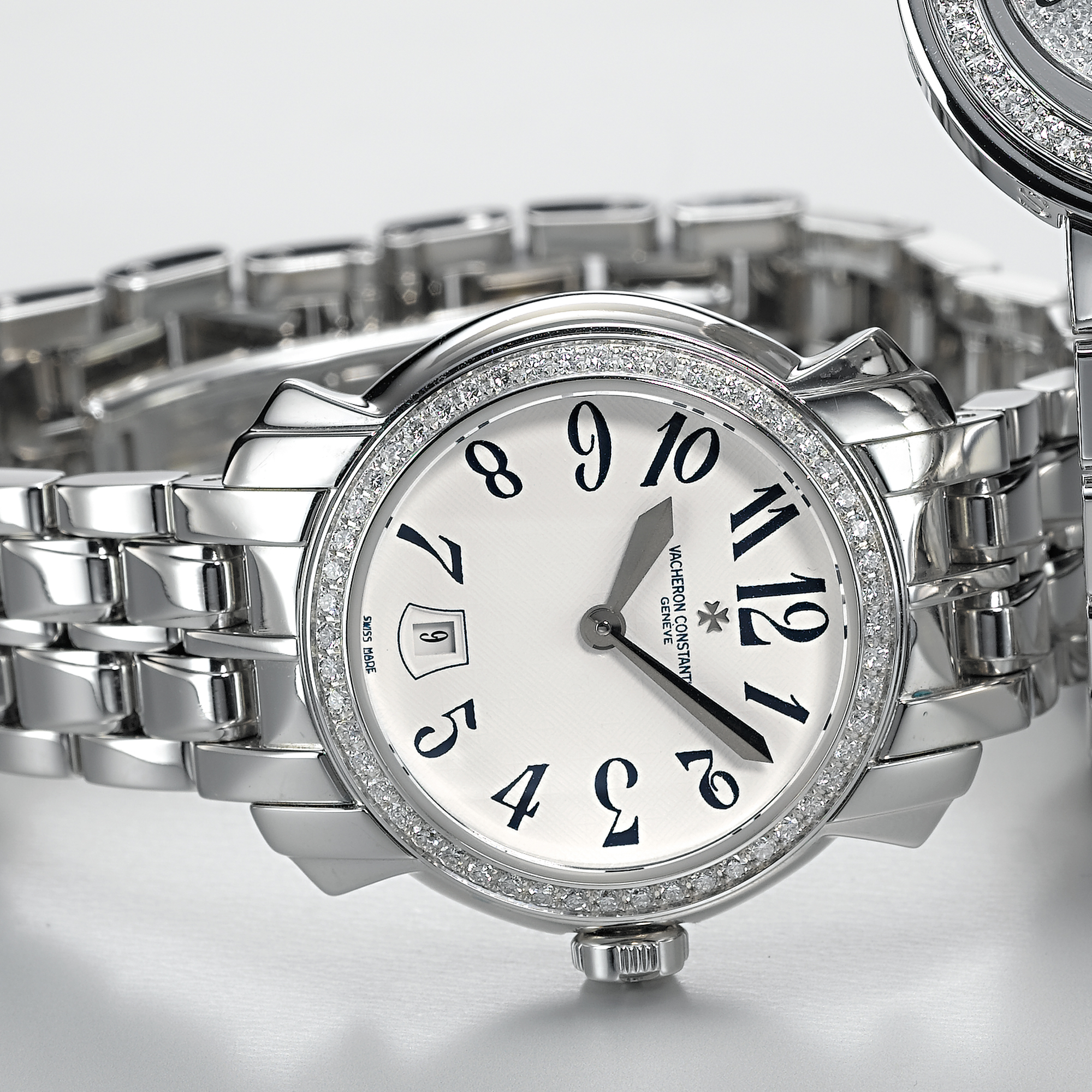 VACHERON CONSTANTIN, A LADY'S WHITE GOLD AND DIAMOND SET WRISTWATCH WITH DATEMALTE, CIRCA 2003