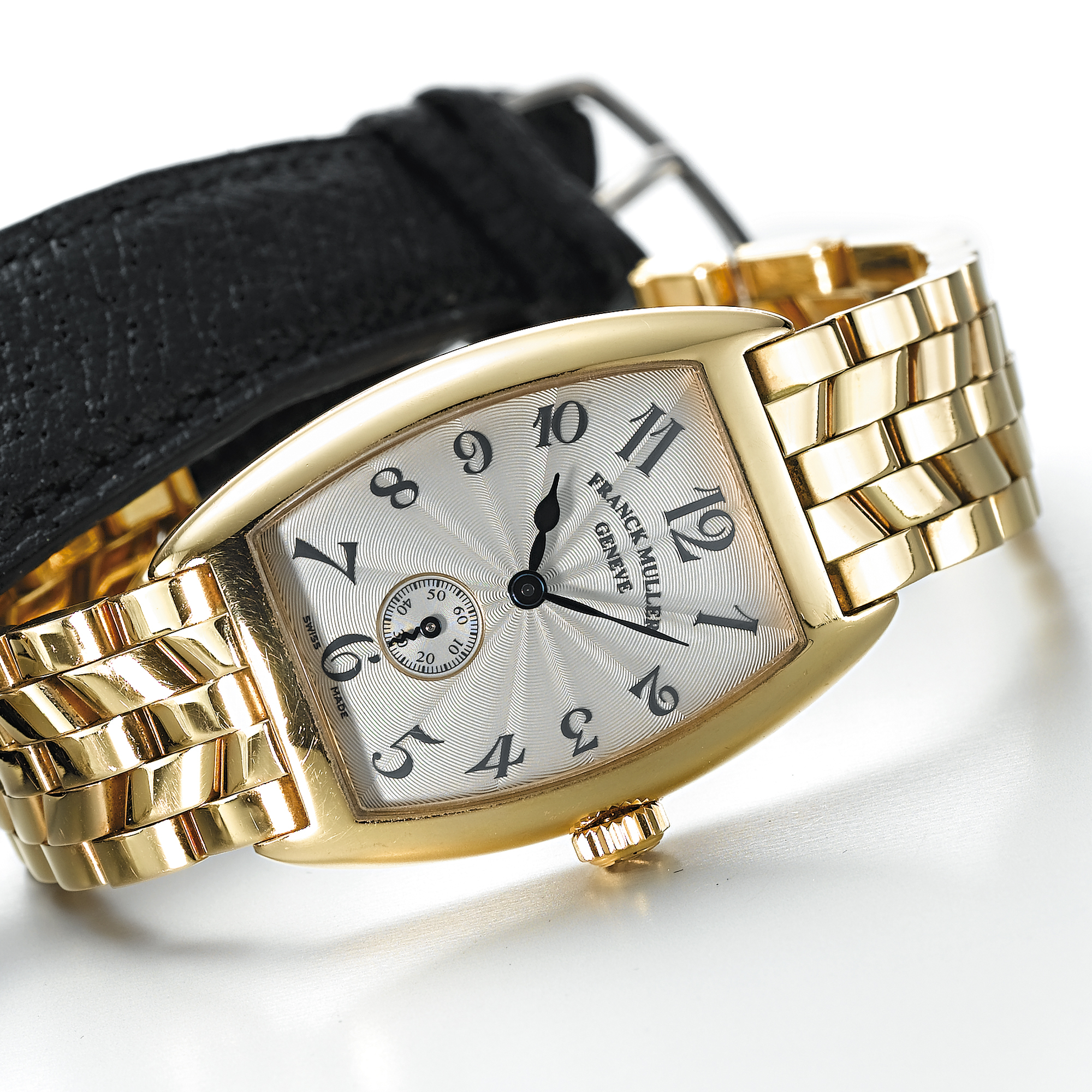 FRANCK MULLER, A LADY'S GOLD TONNEAU FORM WRISTWATCH WITH BRACELETCIRCA 1998, 1750 S6 PM, NO. 101