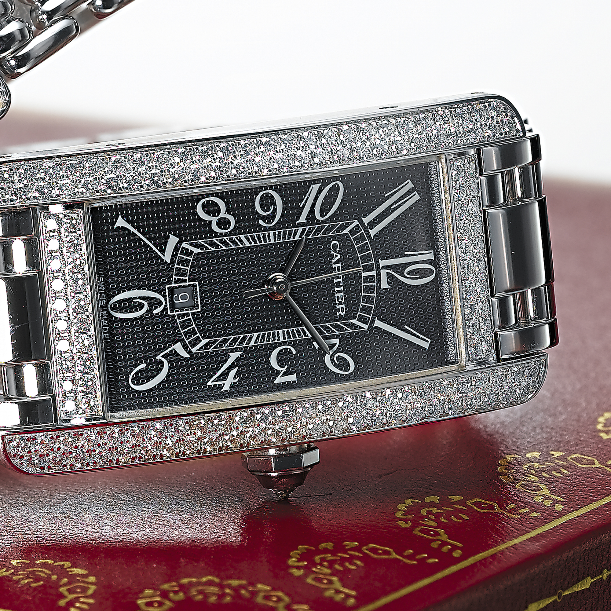 CARTIER, A LADY'S WHITE GOLD AND DIAMOND SET AUTOMATIC CENTRE SECONDS RECTANGULAR WRISTWATCH WITH DATE AND BRACELETTANK AMERICAINE, CIRCA 2003