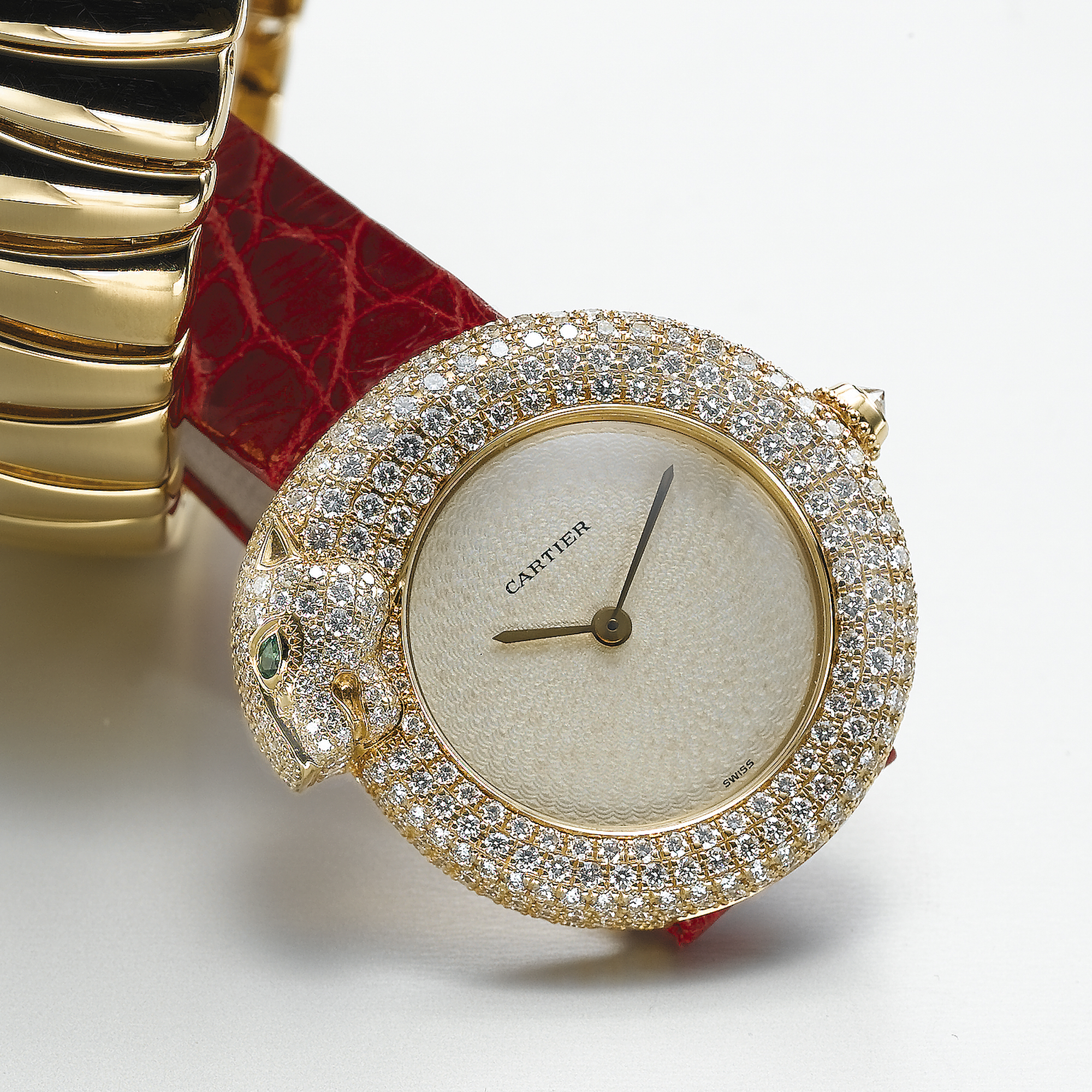 CARTIER, A LADY'S GOLD, DIAMOND AND EMERALD SET WRISTWATCHPANTHER, CIRCA 2000