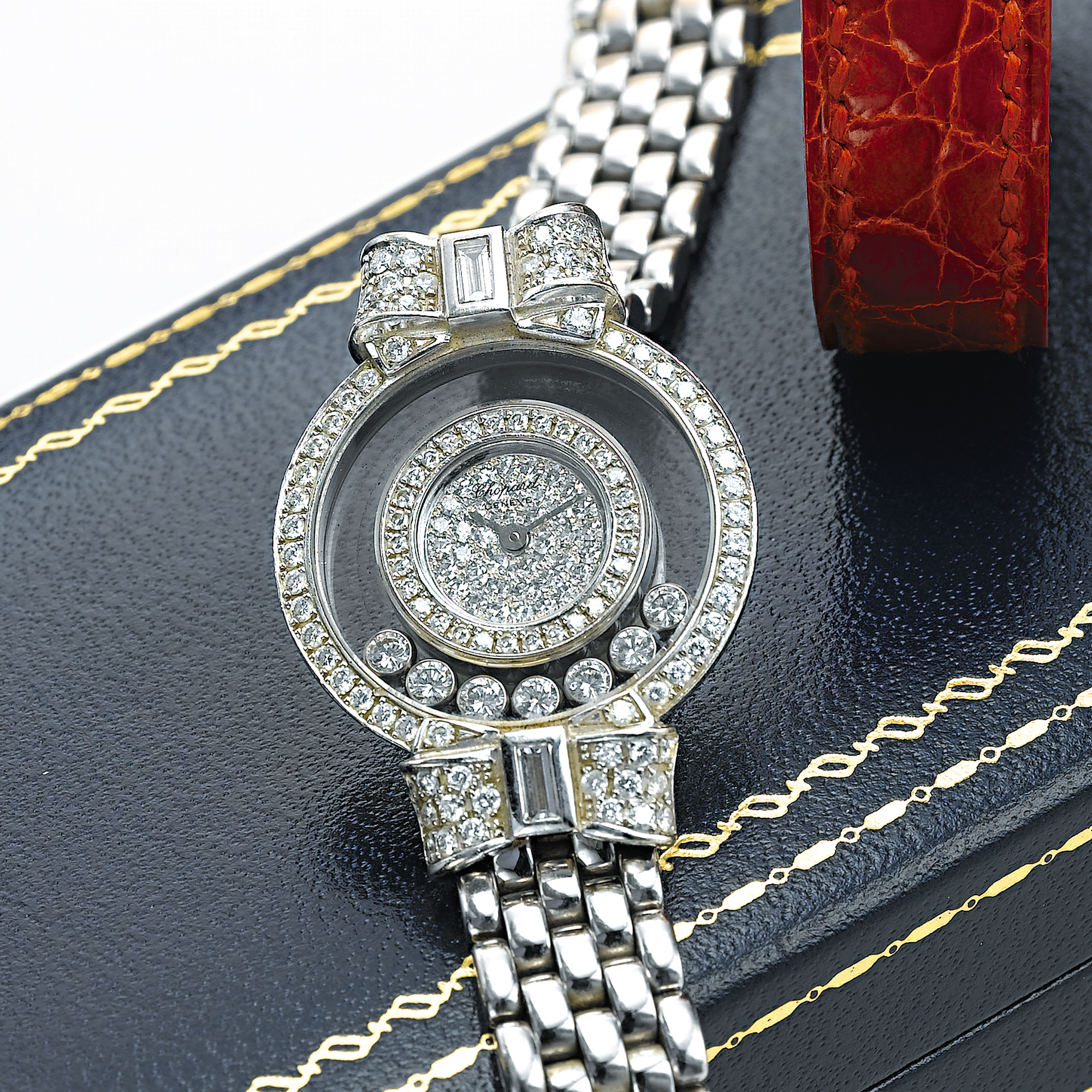 CHOPARD, A LADY'S WHITE GOLD AND DIAMOND SET WRISTWATCH WITH BRACELETHAPPY DIAMONDS, CIRCA 1990