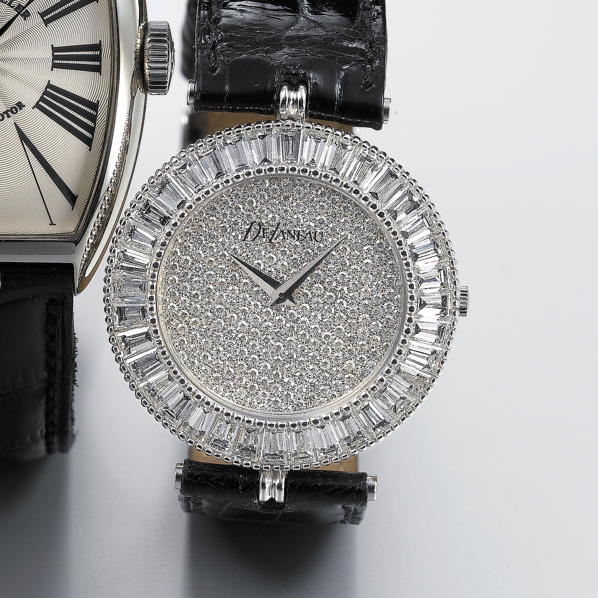 DELANEAU, A LADY'S WHITE GOLD AND DIAMOND SET WRISTWATCHCIRCA 2000 