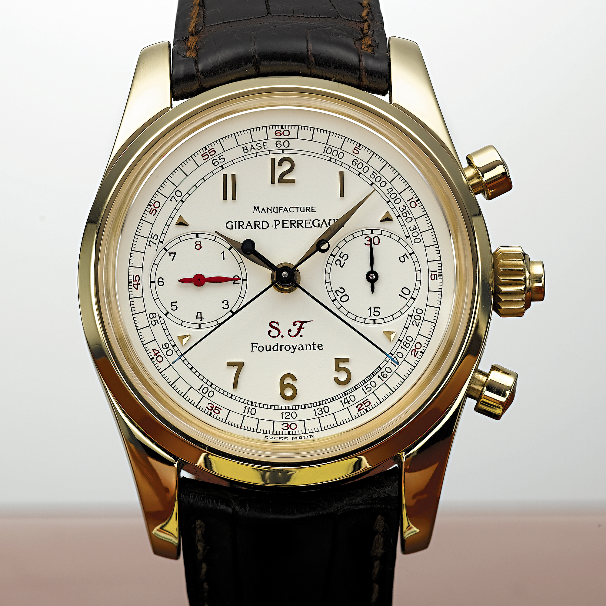 GIRARD-PERREGAUX, A LIMITED EDITION GOLD AUTOMATIC SPLIT-SECONDS CHRONOGRAPH WRISTWATCH WITH REGISTERS AND TACHYMETERFOUDROYANTE, SCUDERIA FERRARI, CIRCA 2001, NO. 142/250