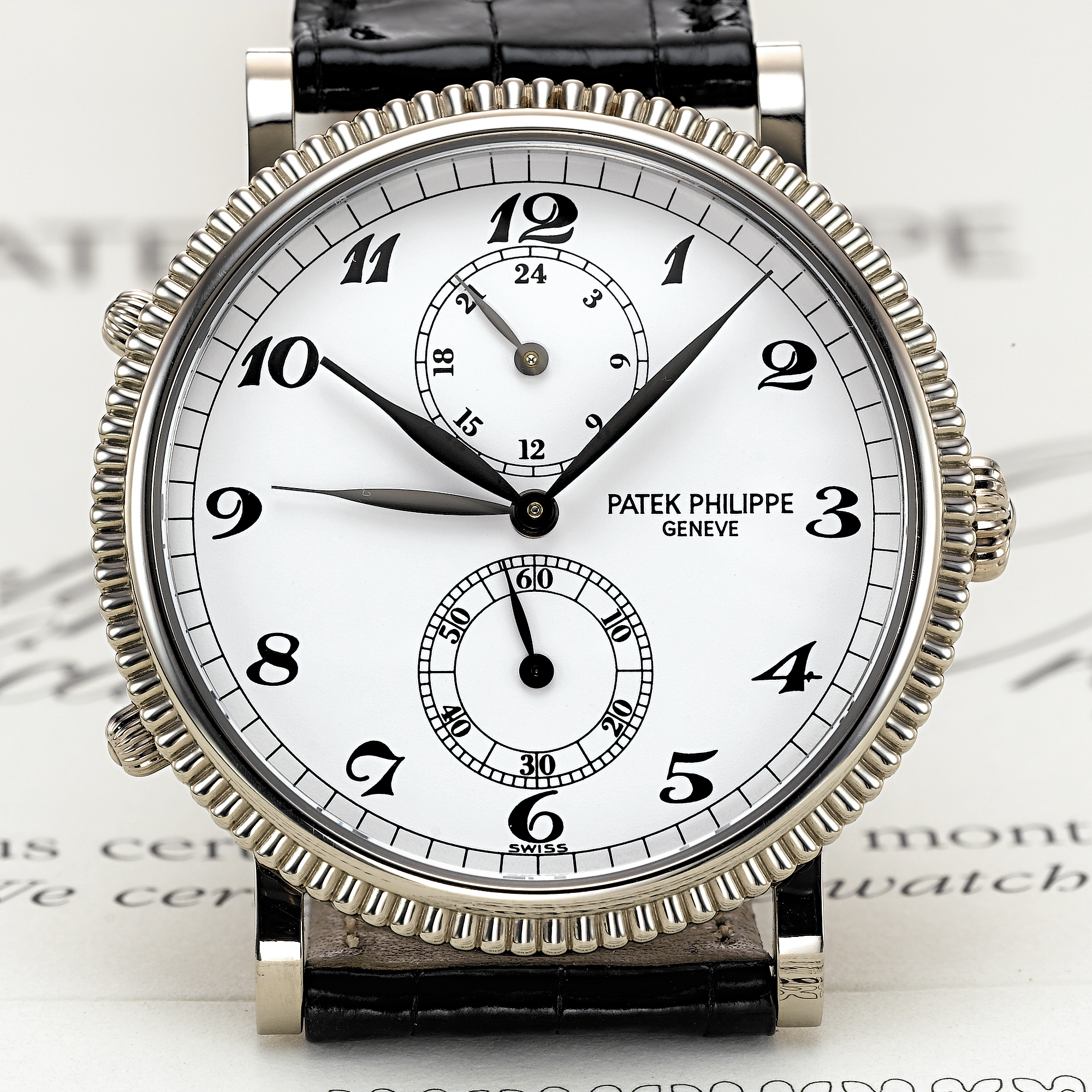 PATEK PHILIPPE, A WHITE GOLD DUAL TIME ZONE WRISTWATCH WITH 24-HOUR INDICATIONTRAVEL TIME, CIRCA 1999, NO. 3.080.589, REF. 5034