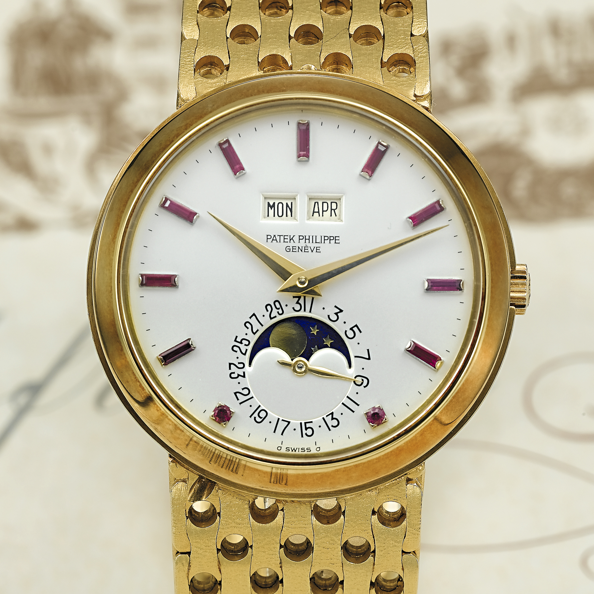 PATEK PHILIPPE, AN EXTREMELY RARE AND EXCEPTIONAL GOLD AUTOMATIC PERPETUAL CALENDAR BRACELET WATCH WITH RUBY INDICES AND MOON PHASESCIRCA 1965, NO. 1.119.038, REF. 3448/8