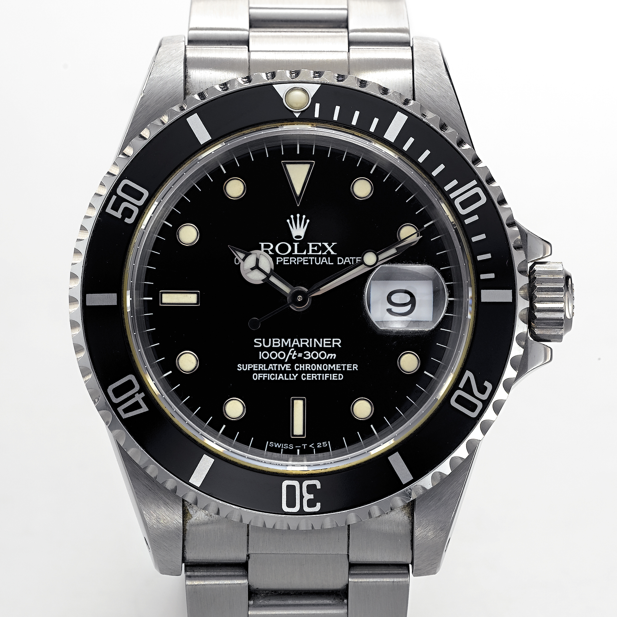 ROLEX, A STAINLESS STEEL AUTOMATIC CENTRE SECONDS WRISTWATCH WITH DATE AND BRACELETSUBMARINER, OYSTER PERPETUAL, CIRCA 1996, REF. 16610