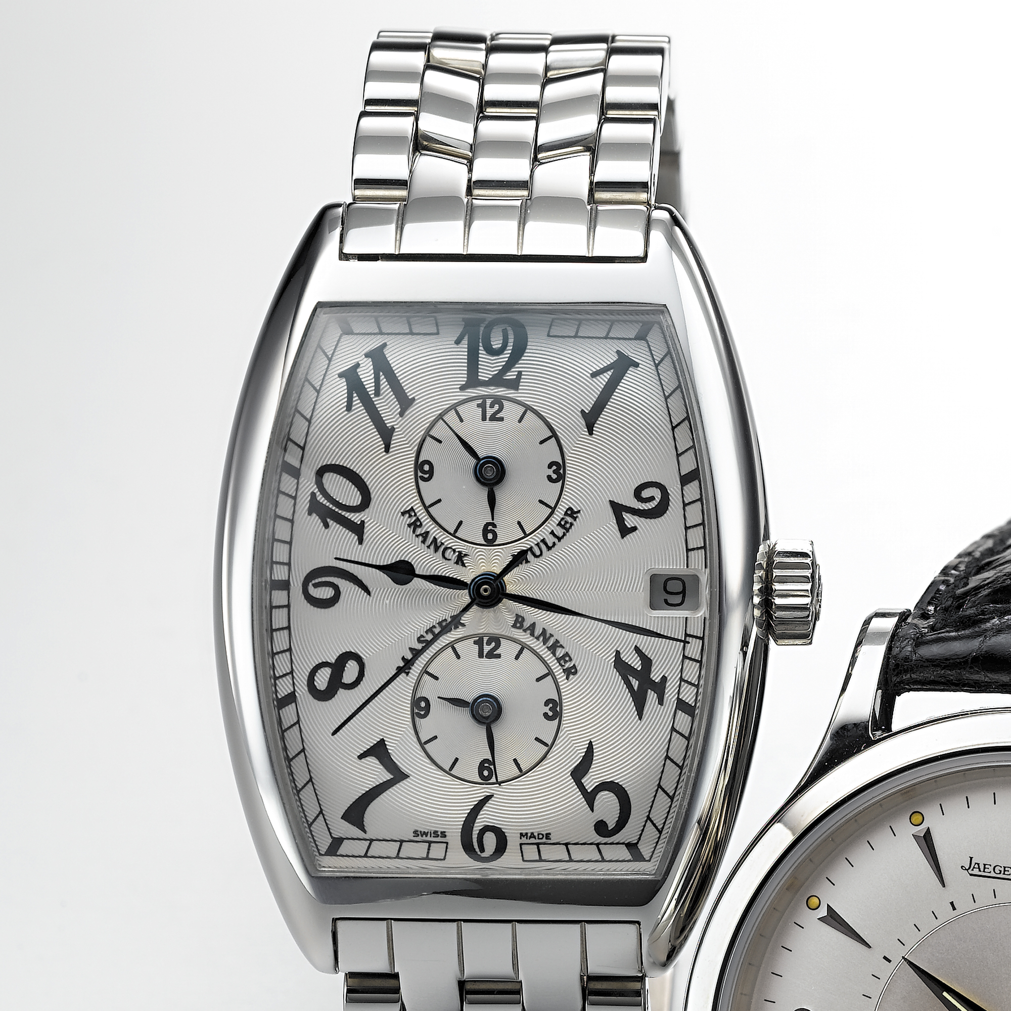 FRANCK MULLER, A STAINLESS STEEL TONNEAU FORM AUTOMATIC CENTRE SECONDS TRIPLE TIME ZONE WRISTWATCH WITH DATE AND BRACELETMASTER BANKER, CIRCA 1997, 2852 MB, NO. 100