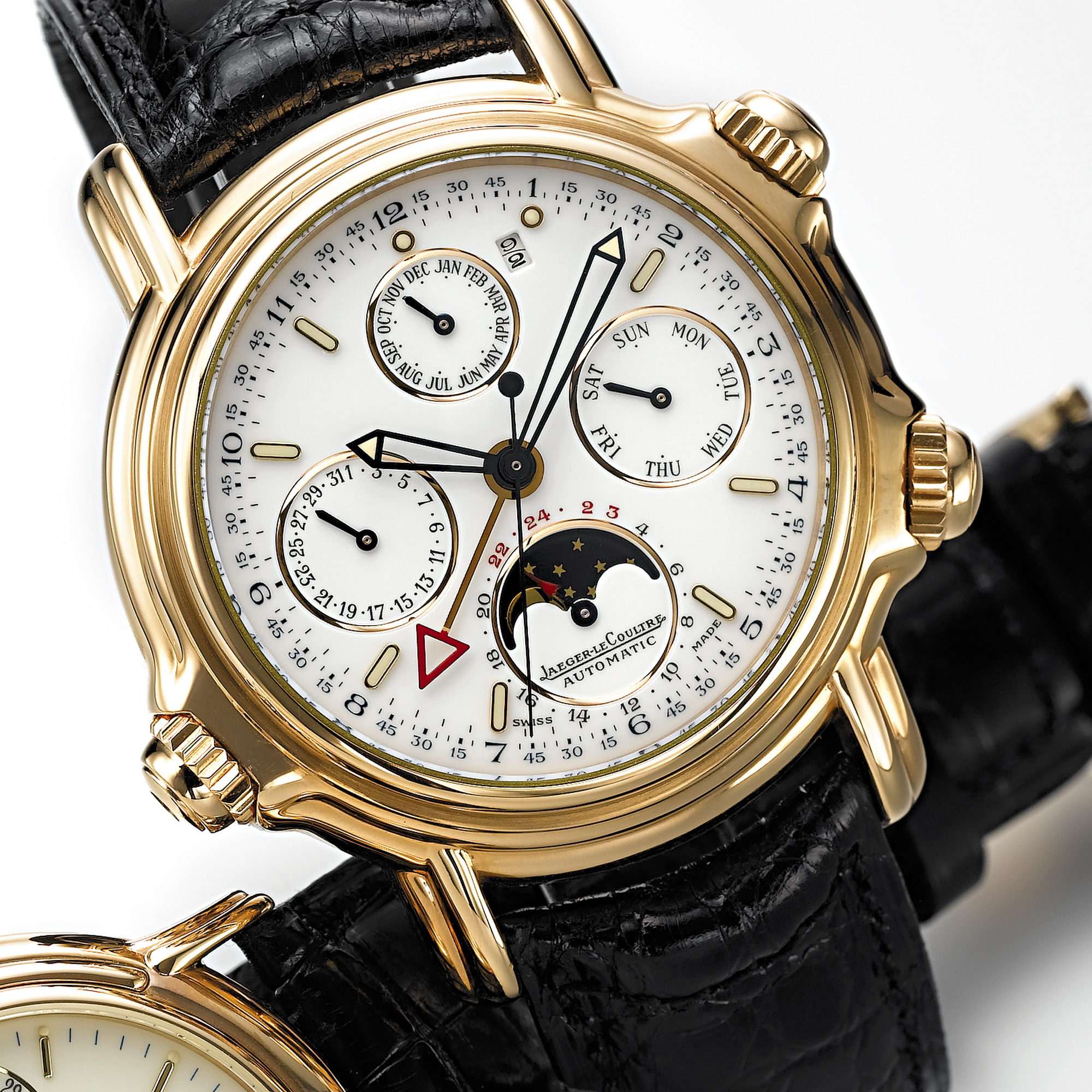 JAEGER-LE COULTRE, A LIMITED EDITION PINK GOLD AUTOMATIC CENTRE SECONDS PERPETUAL CALENDAR  WRISTWATCH WITH ALARM AND MOON PHASESGRAND REVEIL, CIRCA 1990, NO.28/250 