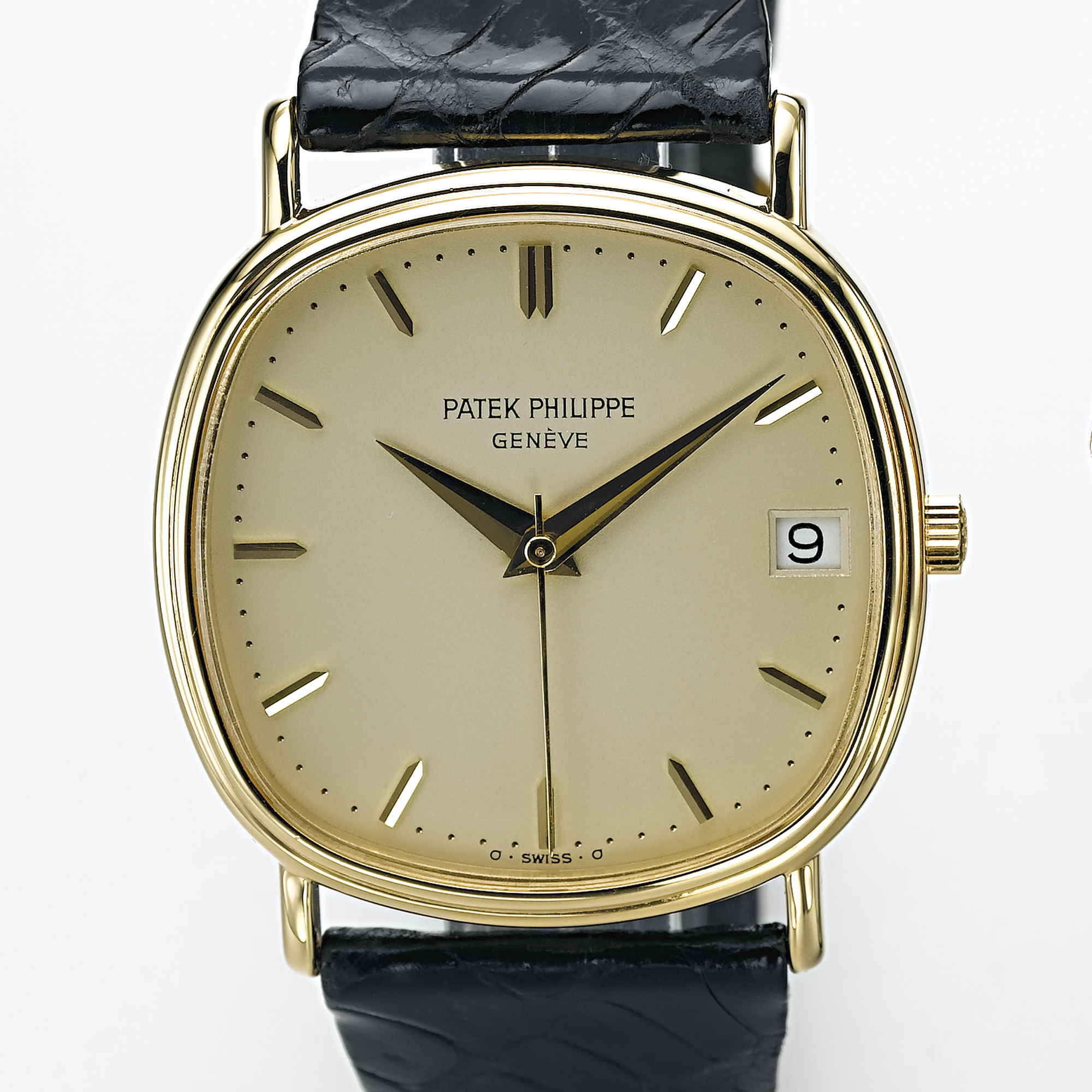 PATEK PHILIPPE, A GOLD AUTOMATIC CENTRE SECONDS CUSHION FORM WRISTWATCH WITH DATECIRCA 1979, NO. 1.440.220, REF. 3734