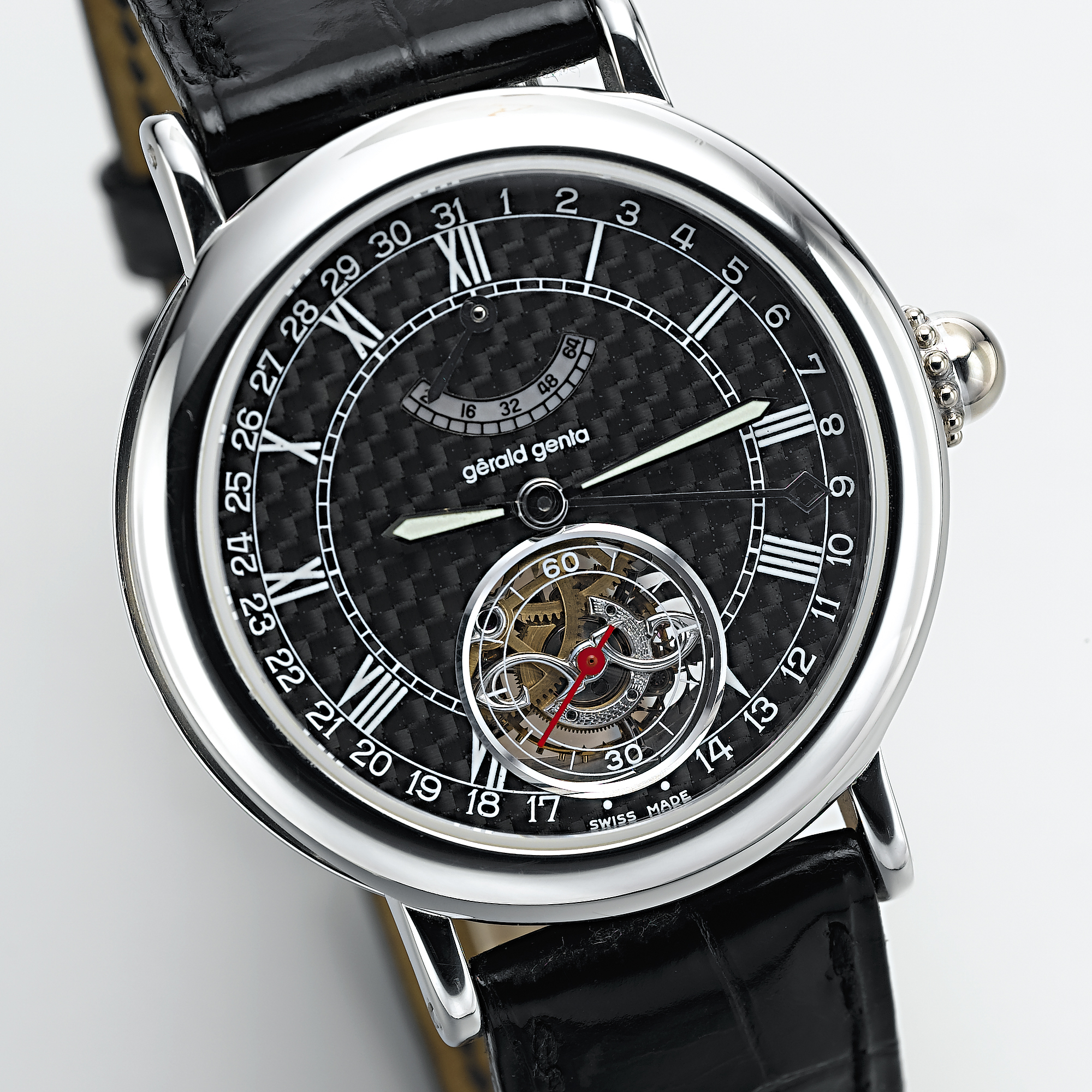 GERALD GENTA, A WHITE GOLD AUTOMATIC TOURBILLION WRISTWATCH WITH POWER RESERVE INDICATION AND DATECIRCA 2000