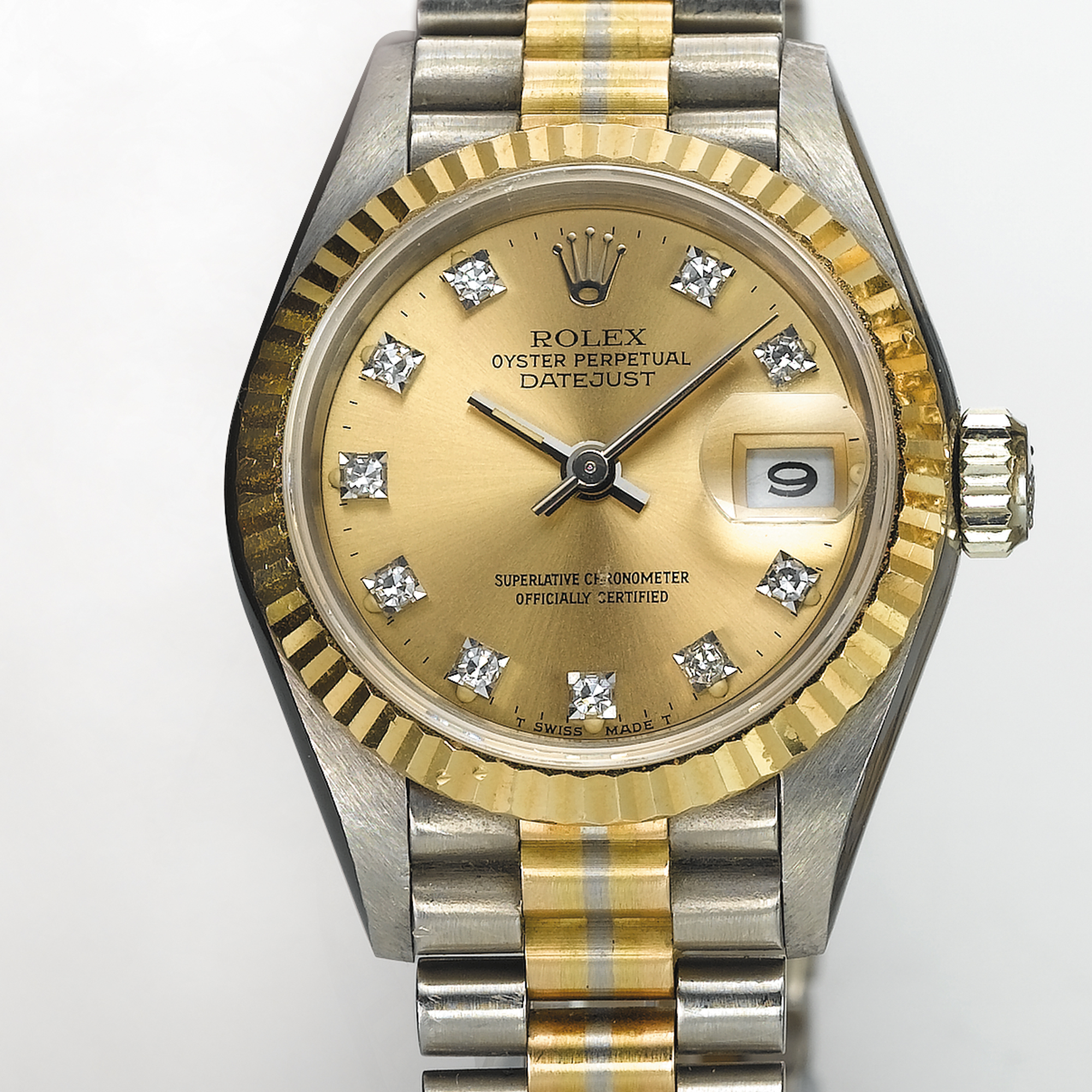ROLEX, A LADY'S THREE-COLOUR GOLD AND DIAMOND SET AUTOMATIC CENTRE SECONDS WRISTWATCH WITH DATE AND BRACELETDATEJUST, OYSTER PERPETUAL, CIRCA 1984, REF. 69179B