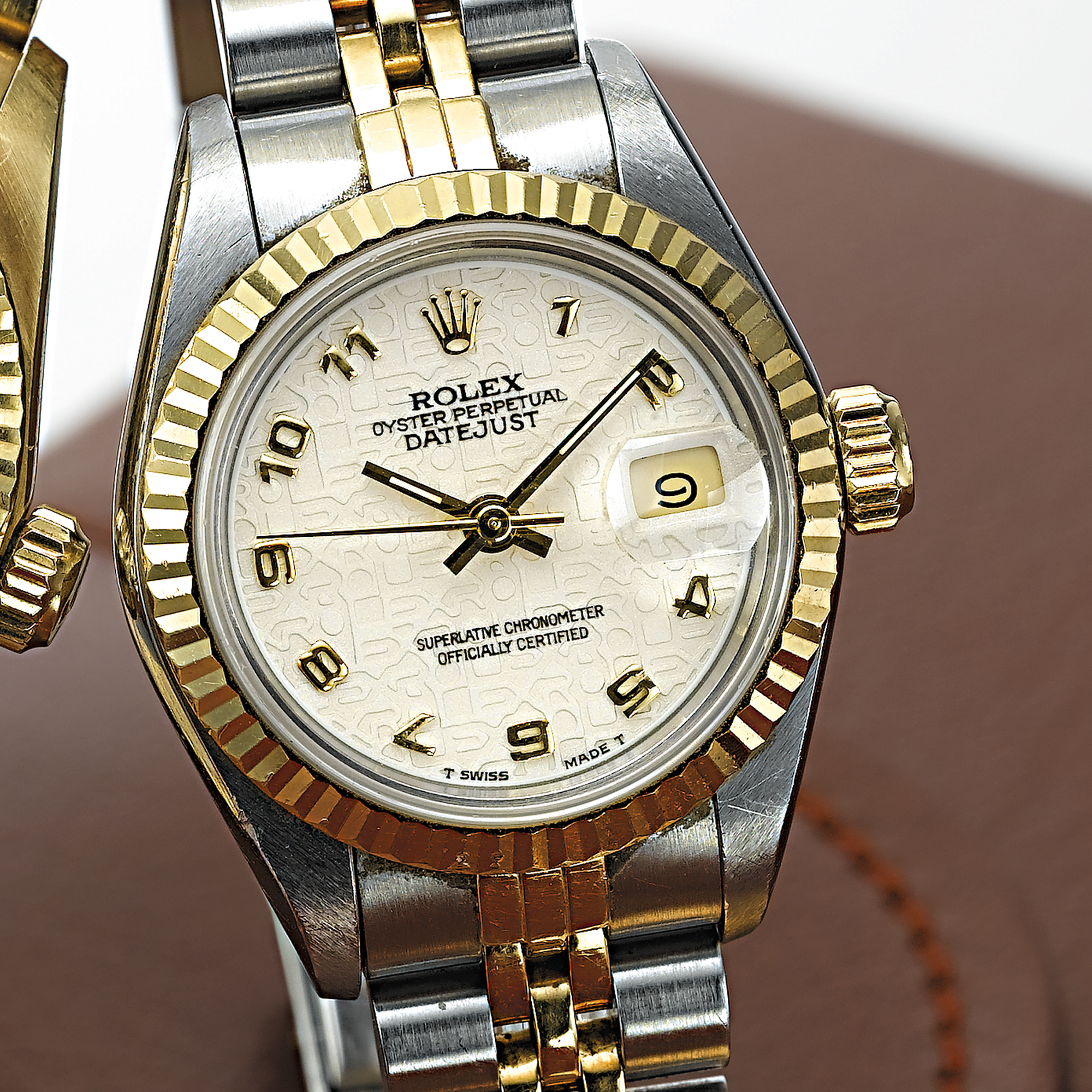 ROLEX, A LADY'S GOLD AND STAINLESS STEEL AUTOMATIC CENTRE SECONDS WRISTWATCH WITH DATE AND BRACELETDATEJUST, OYSTER PERPETUAL, CIRCA 1990, REF. 69173
