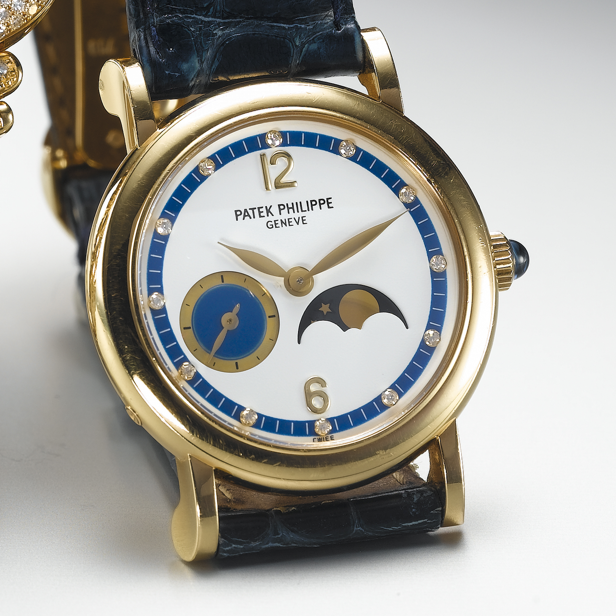 PATEK PHILIPPE, A LADY'S FINE GOLD AND DIAMOND SET WRISTWATCH WITH ECCENTRIC SECONDS AND MOON PHASESCIRCA 2001, NO. 3.114.944, REF. 4857