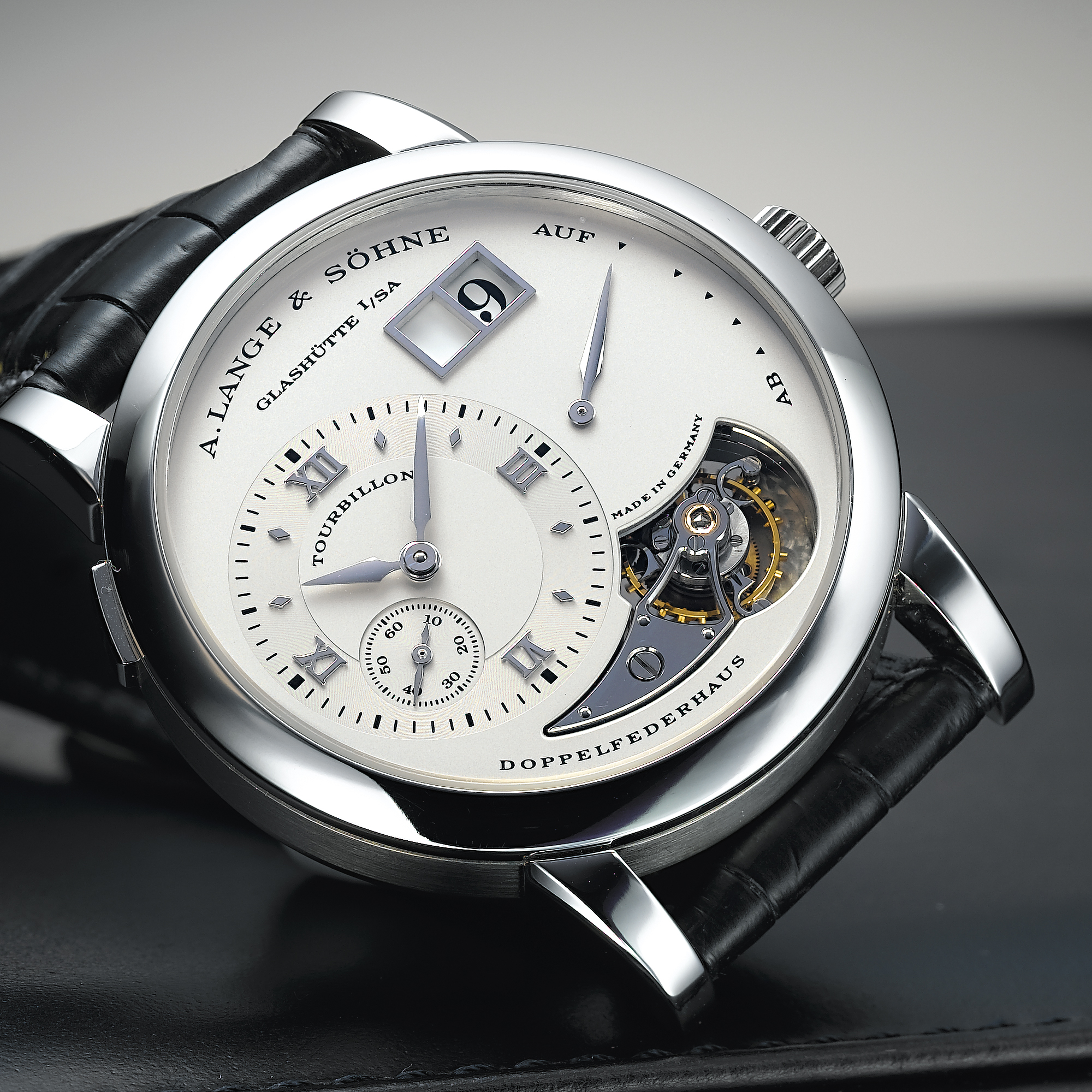 A. LANGE & SÖHNE, A FINE AND RARE LIMITED EDITION PLATINUM TOURBILLON WRISTWATCH WITH OVERSIZED DATE AND POWER RESERVE LANGE 1 TOURBILLON, CIRCA 2001, NO. 128/150