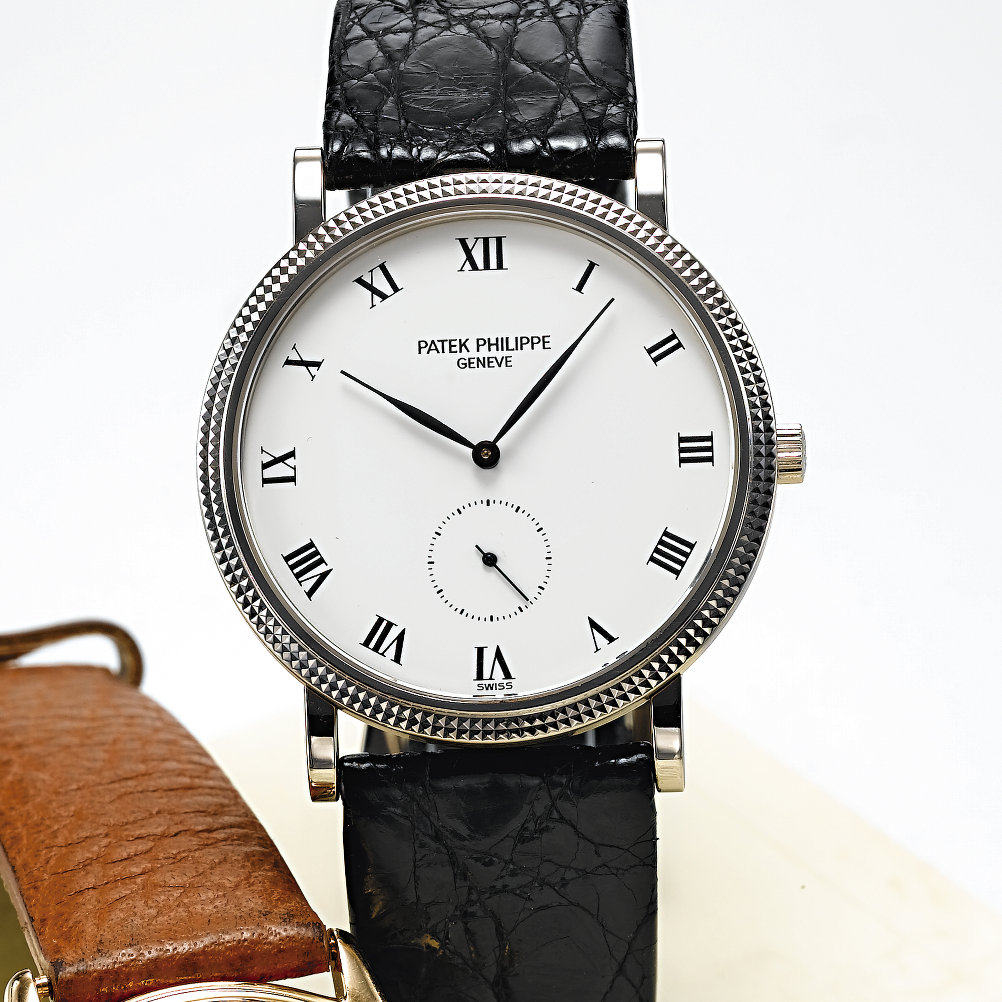 PATEK PHILIPPE, A FINE WHITE GOLD CIRCULAR WRISTWATCH CIRCA 1987, NO.1.857.542, REF.3919