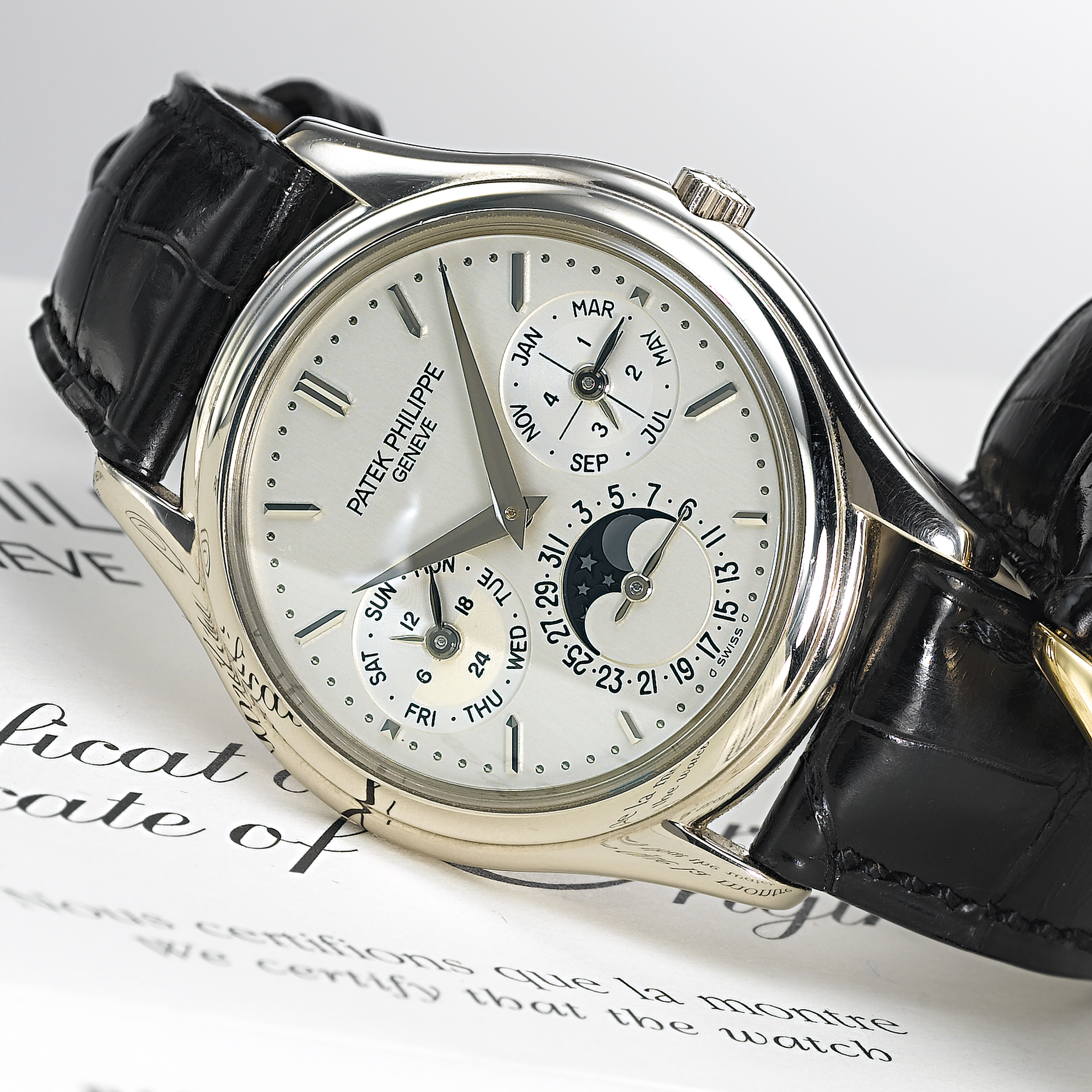 PATEK PHILIPPE, A FINE WHITE GOLD AUTOMATIC PERPETUAL CALENDAR WITH MOON PHASESCIRCA 2004, NO. 3.126.638, REF. 3940
