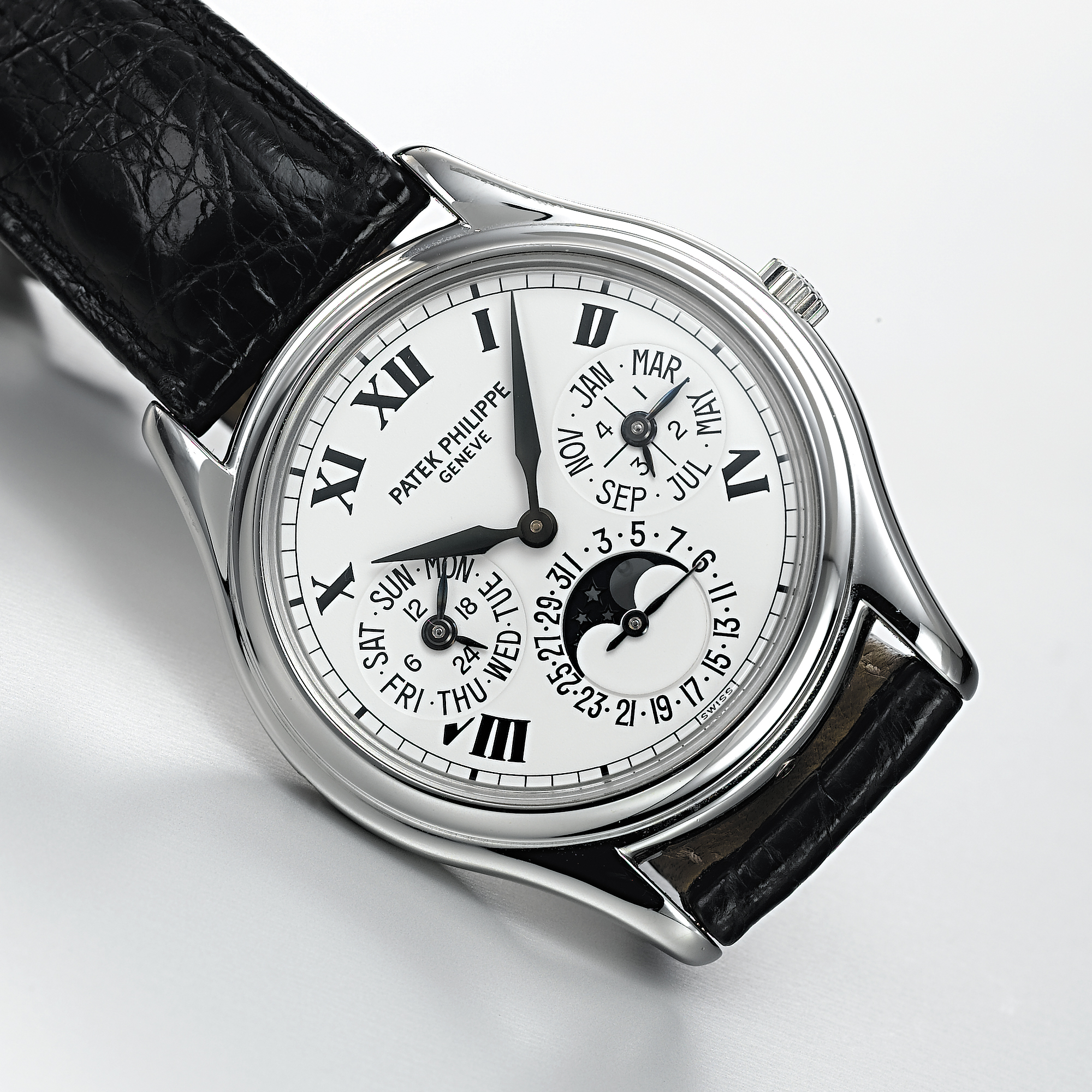 PATEK PHILIPPE, A FINE PLATINUM AUTOMATIC PERPETUAL CALENDAR WRISTWATCH WITH MOON PHASESCIRCA 2005, REF. 3940