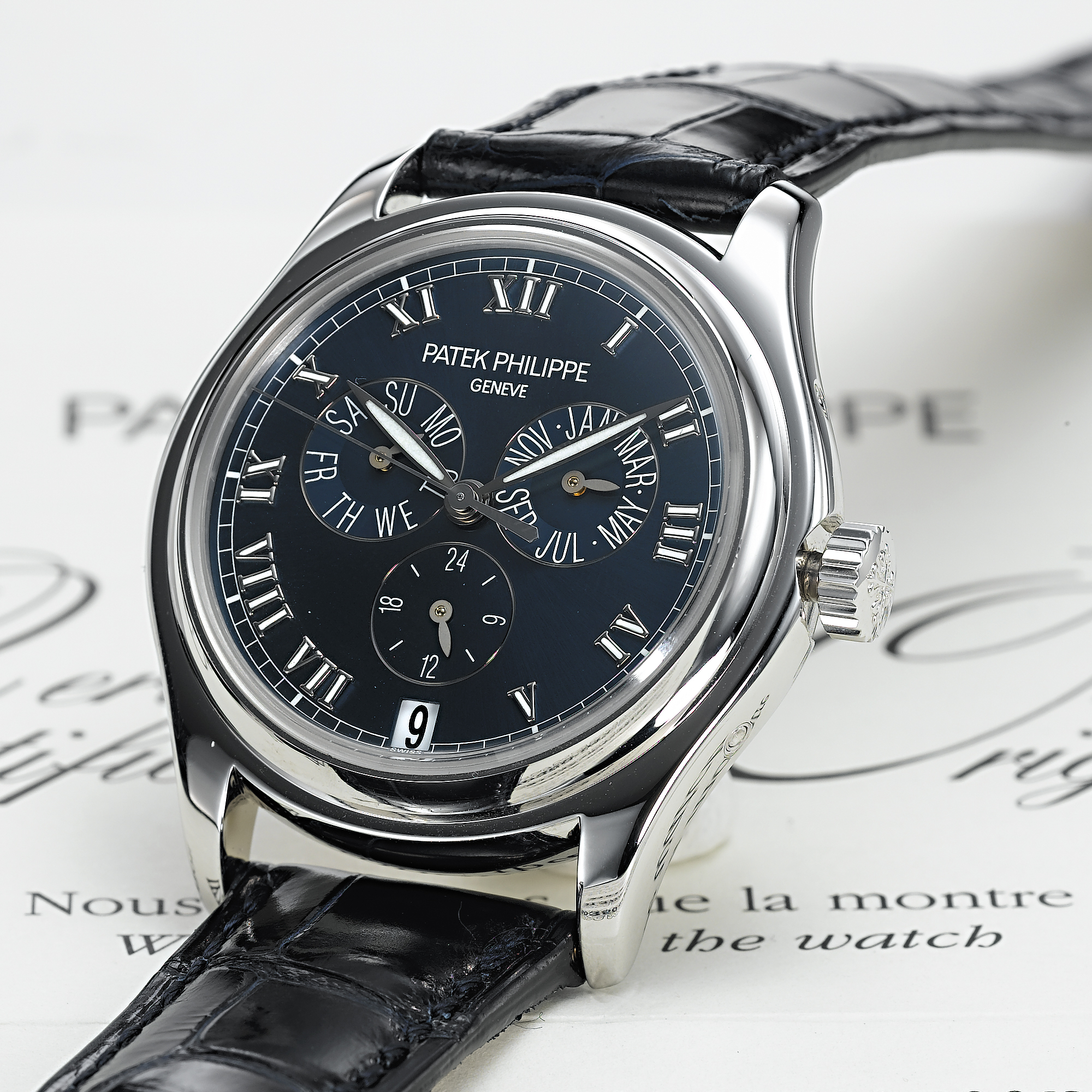 PATEK PHILIPPE, A FINE LIMITED EDITION WHITE GOLD AUTOMATIC ANNUAL CALENDAR CENTRE SECONDS WRISTWATCHCIRCA 2004, NO. 3.137.279, REF. 5035G-043